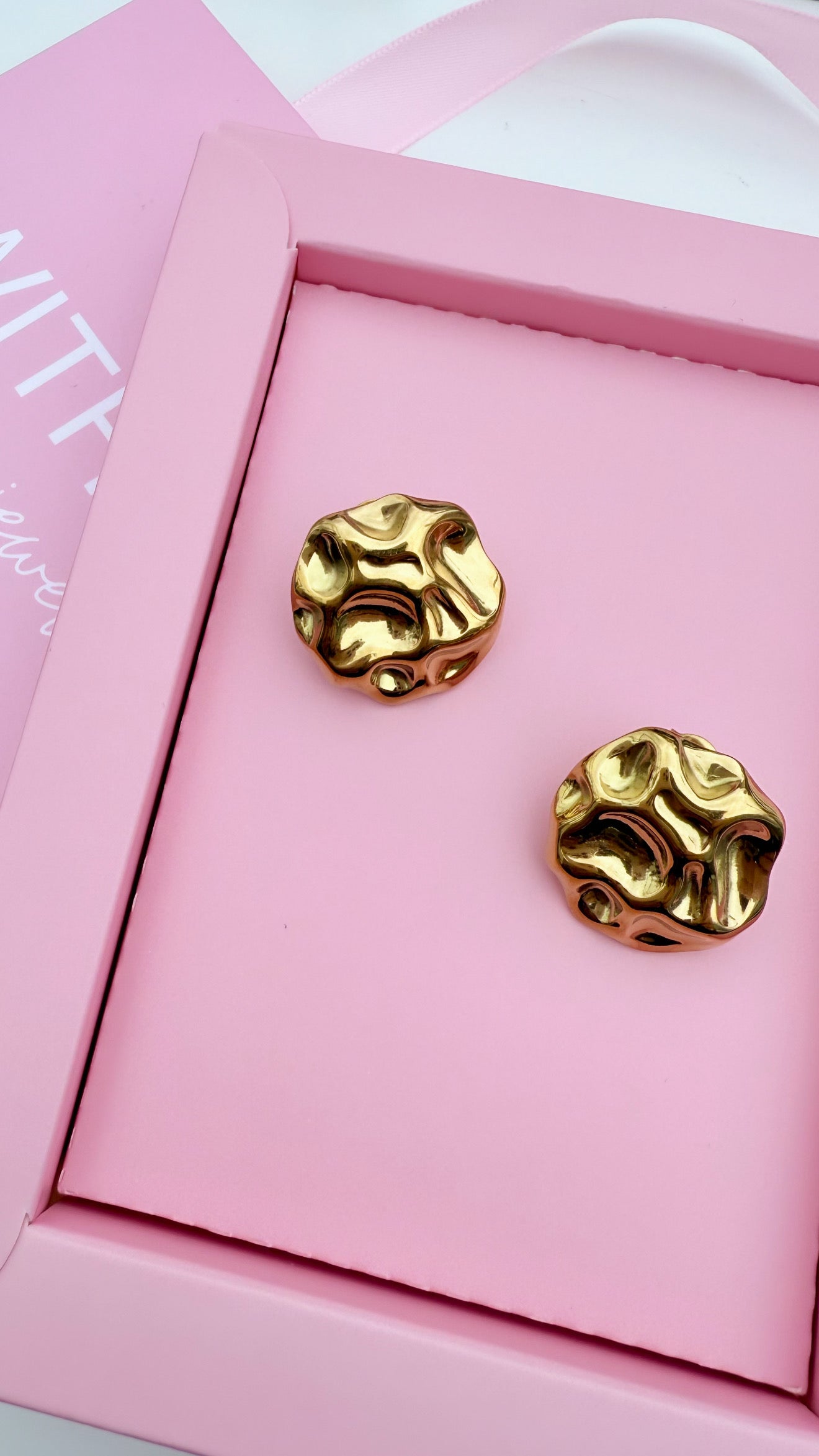 Brincos Button
